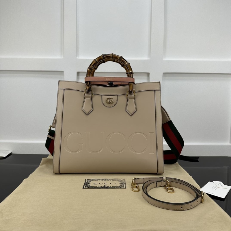 G*u*i top handle bags